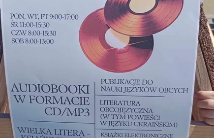 plakat informujący o bibliotece